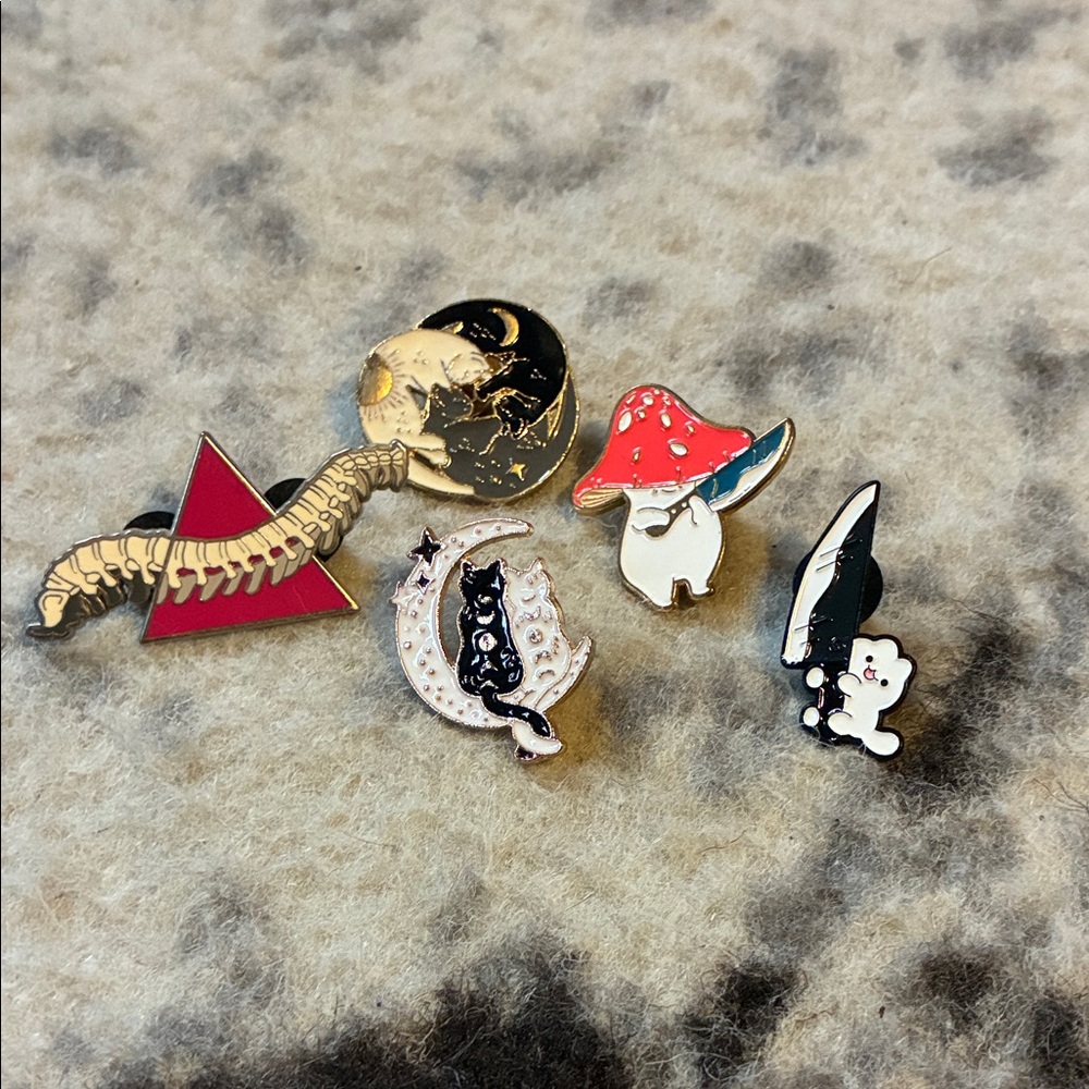 Set of Enamel Pins with Unique Designs